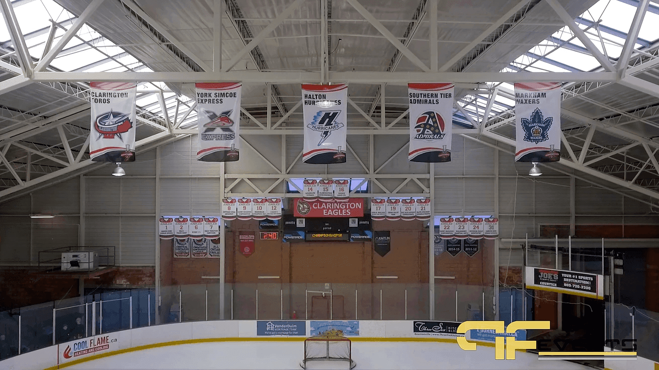 Garnet B. Rickard arena with team banners hanging from the skylit roof trusses