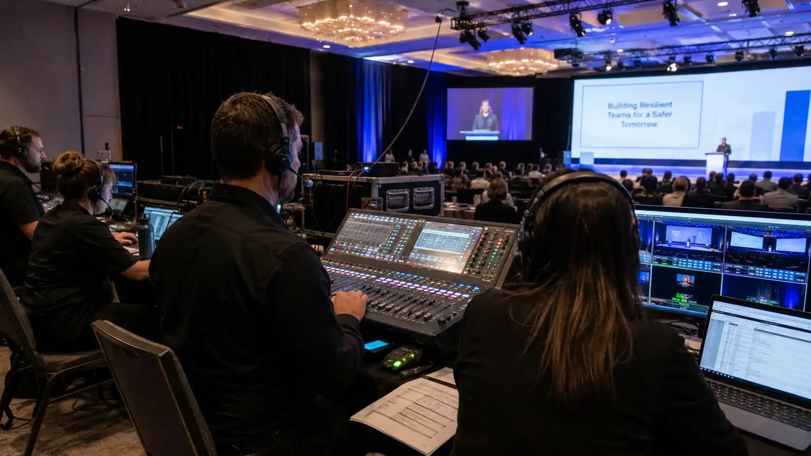 Corporate event production team supporting a safer event plan